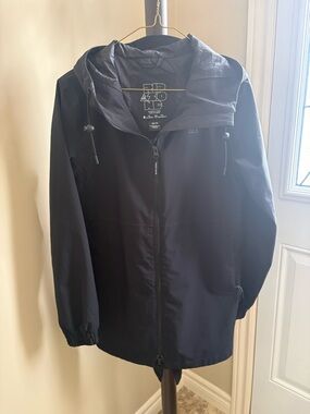 RIPZONE women’s black raincoat.